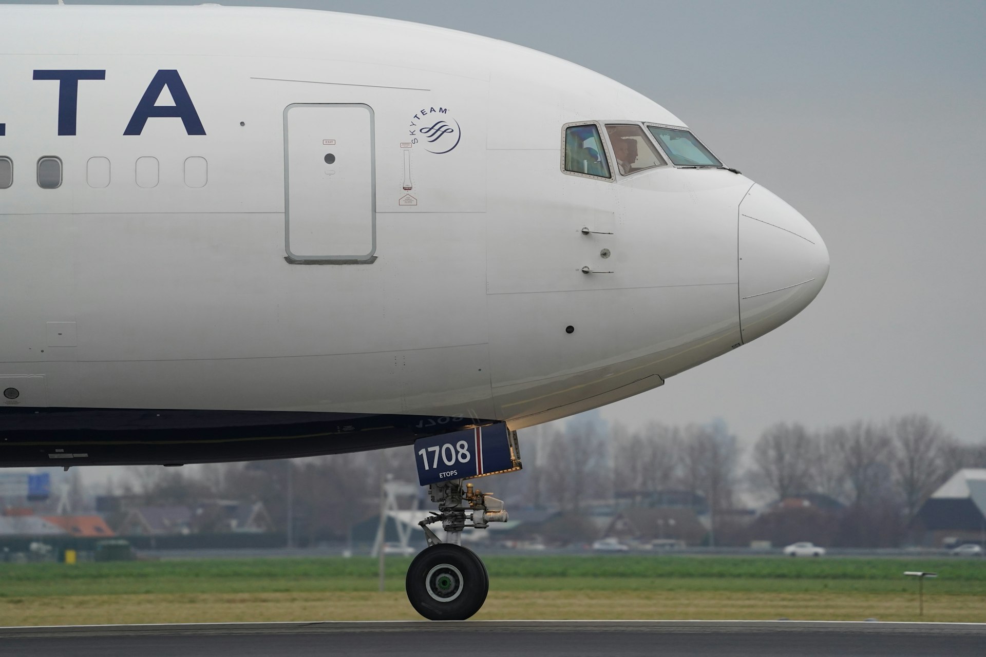 white passenger plane on airport during daytime